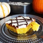 Easy Pumpkin Cake with Cream Cheese Frosting and Drizzled Chocolate sauce